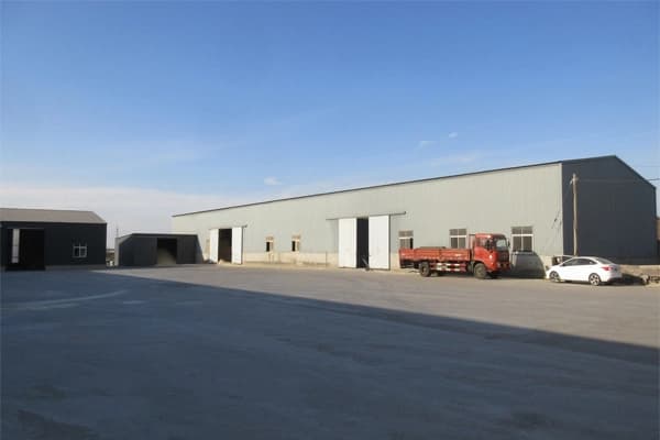 Wide view of a pet product production floor with clean processing lines